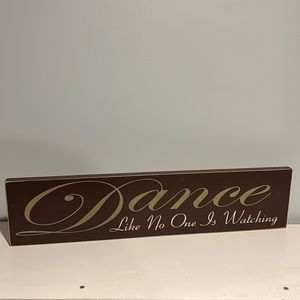 Large wooden sign dance